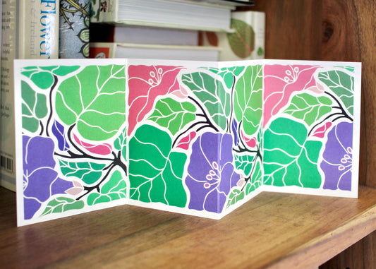A colourful and unique folded landscape greeting card featuring linocut artwork of the morning glory flower