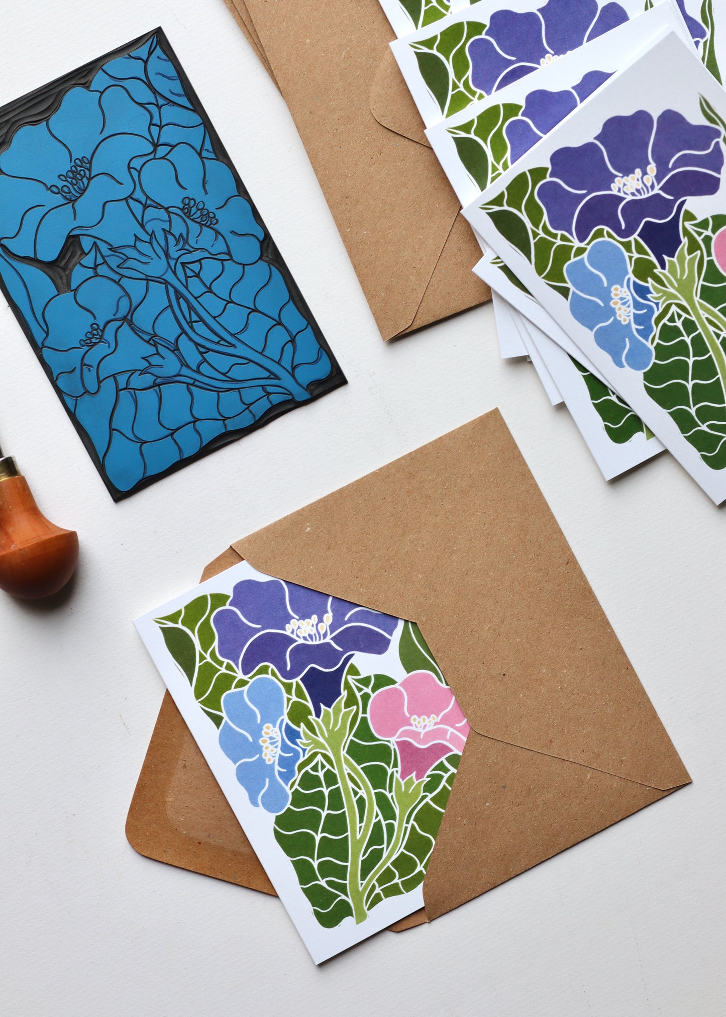 Close-up of morning glory notecard design showing hand-carved linocut texture and vibrant digital colour in purple and green
