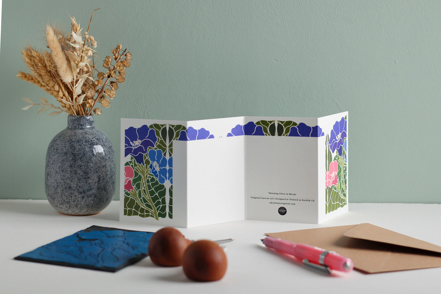 Reverse side of Morning Glory in Bloom Garland card showing blank writing space. Hand-carved botanical design continues on back of concertina card, 300gsm recycled FSC certified cardstock, room for personal message.