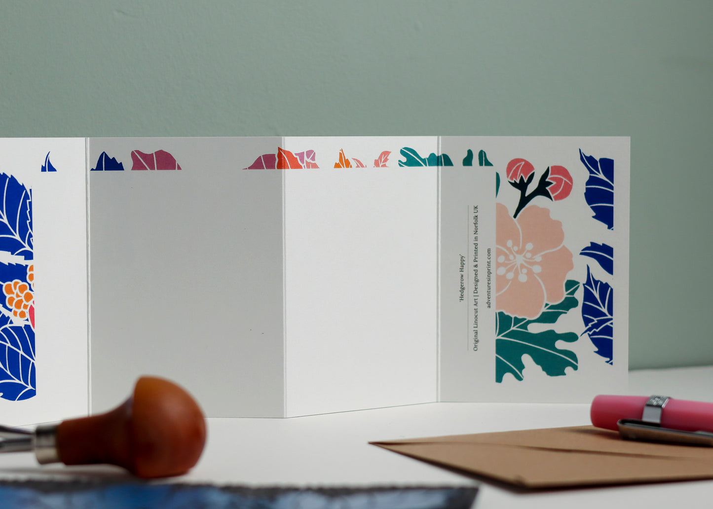 Reverse side of Happy Hedgerow Garland card showing blank writing space. Hand-carved botanical design continues on back of concertina card, 300gsm recycled FSC certified cardstock, room for personal message.