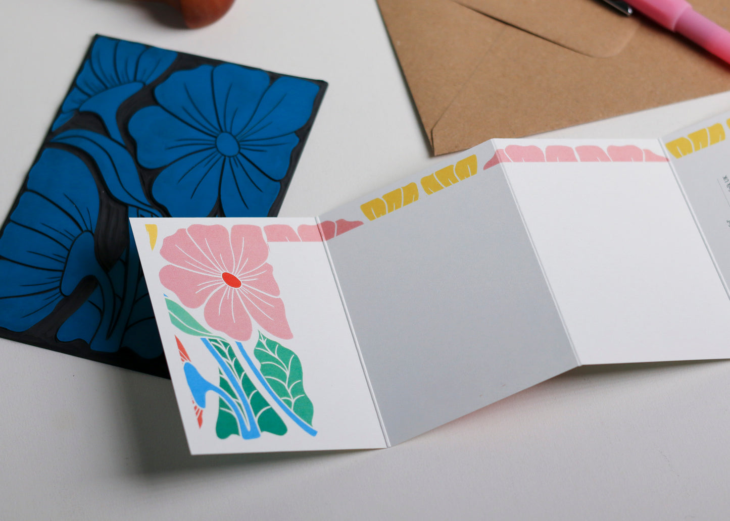 Reverse side of Bright & Beautiful Floral Garland card showing blank writing space. Hand-carved botanical design continues on back of concertina card, 300gsm recycled FSC certified cardstock, room for personal message.