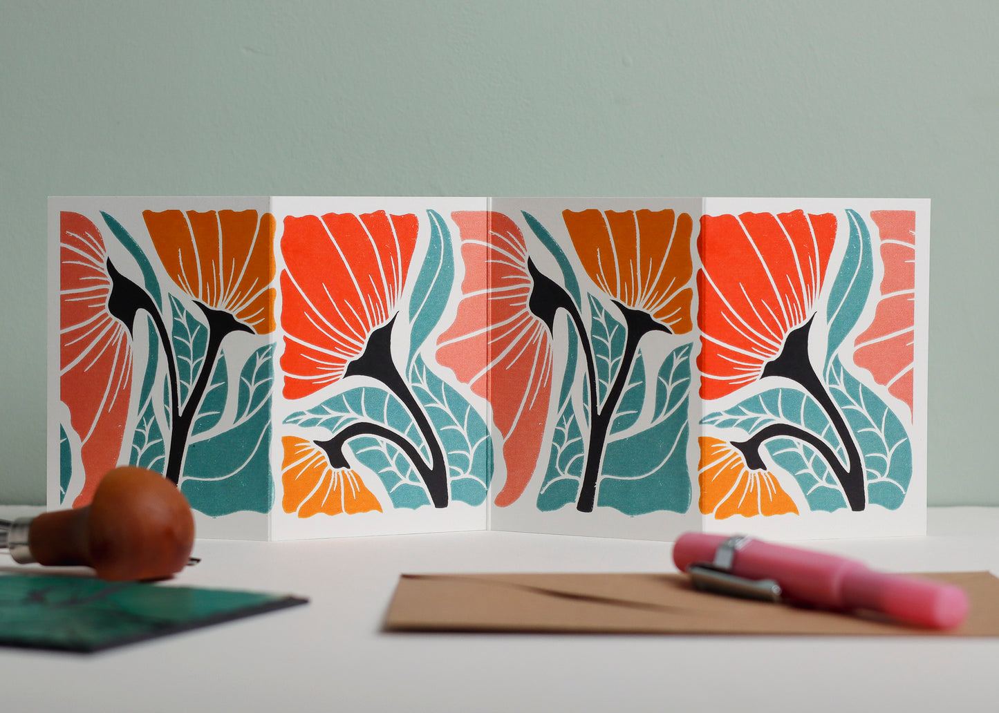 Happy Floral botanical Garland card shown fully extended (105 x 297mm), displaying complete hand-carved linocut design. Modern cottagecore abstract flower portrait, perfect for mantlepiece display.