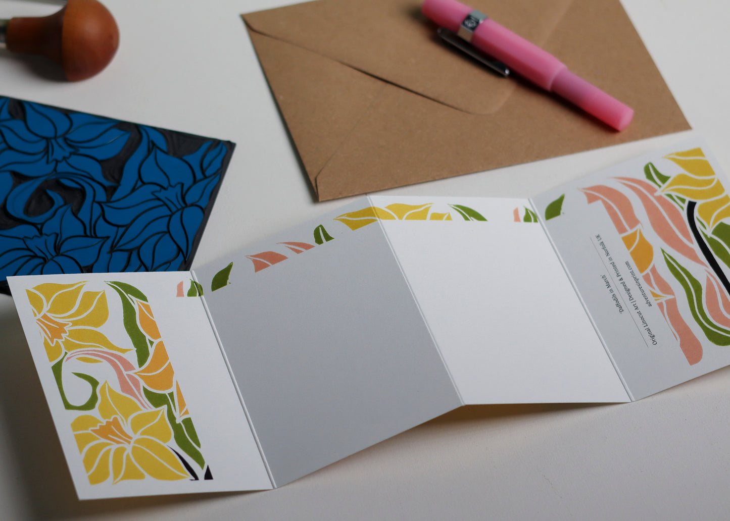 Reverse side of Daffodil Garland card showing blank writing space. Hand-carved botanical design continues on back of concertina card, 300gsm recycled FSC certified cardstock, room for personal message