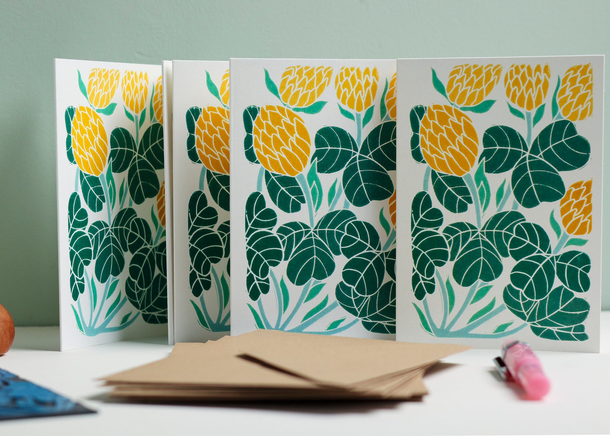 Irish Clover notecard set with recycled kraft envelopes. Eight A6 hand-carved botanical greeting cards and matching envelopes, eco-friendly stationery perfect for thank you notes and correspondence. British flora design