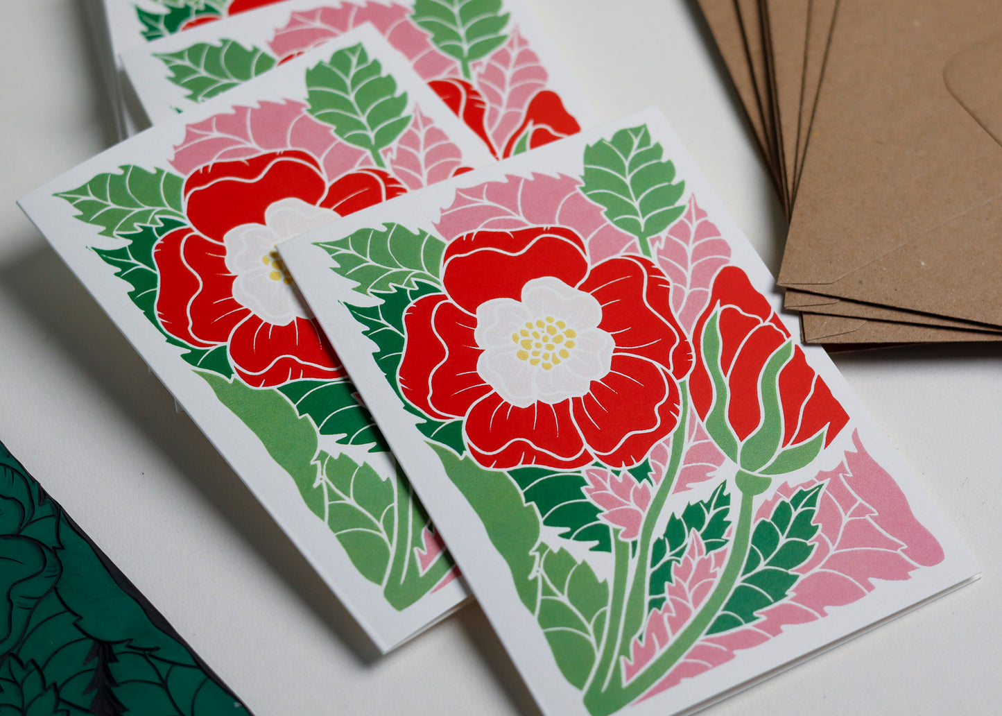 English Tudor Rose notecard set with recycled kraft envelopes. Eight A6 hand-carved botanical greeting cards and matching envelopes, eco-friendly stationery perfect for thank you notes and correspondence. British flora design.