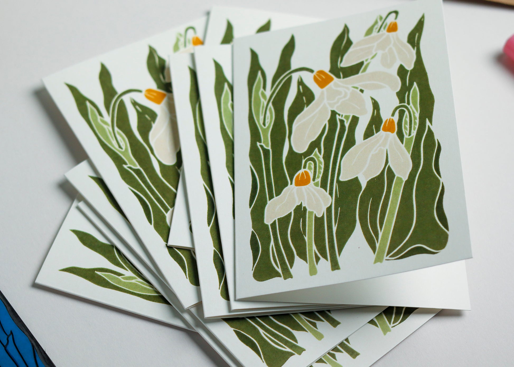 Hand-carved winter snowdrop notecard, one design from botanical stationery set. Linocut print in classic cream and greens on A6 recycled cardstock. Contemporary cottagecore greeting card 