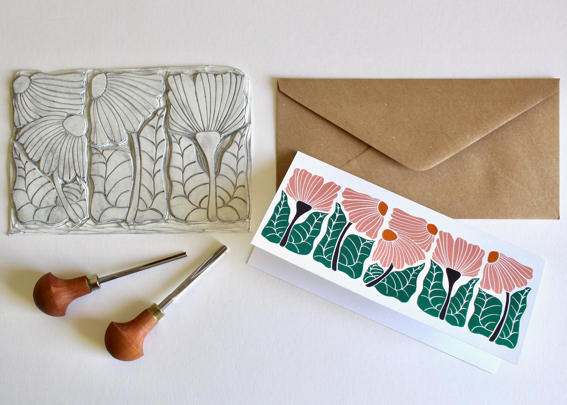 A landscape floral card featuring a row of romantic, swaying abstract flowers.