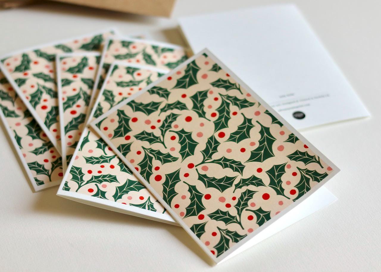 Small batch printed notecards in a set of 8 with envelopes. These notecards are printed in Norfolk UK by Pamela and feature her original linocut floral artwork.